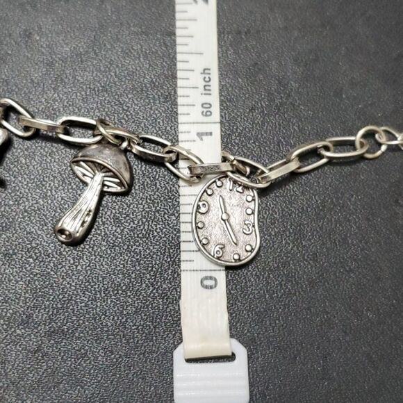 Silver tone Alice in wonderland themed bracelet up to 10" - Picture 6 of 10